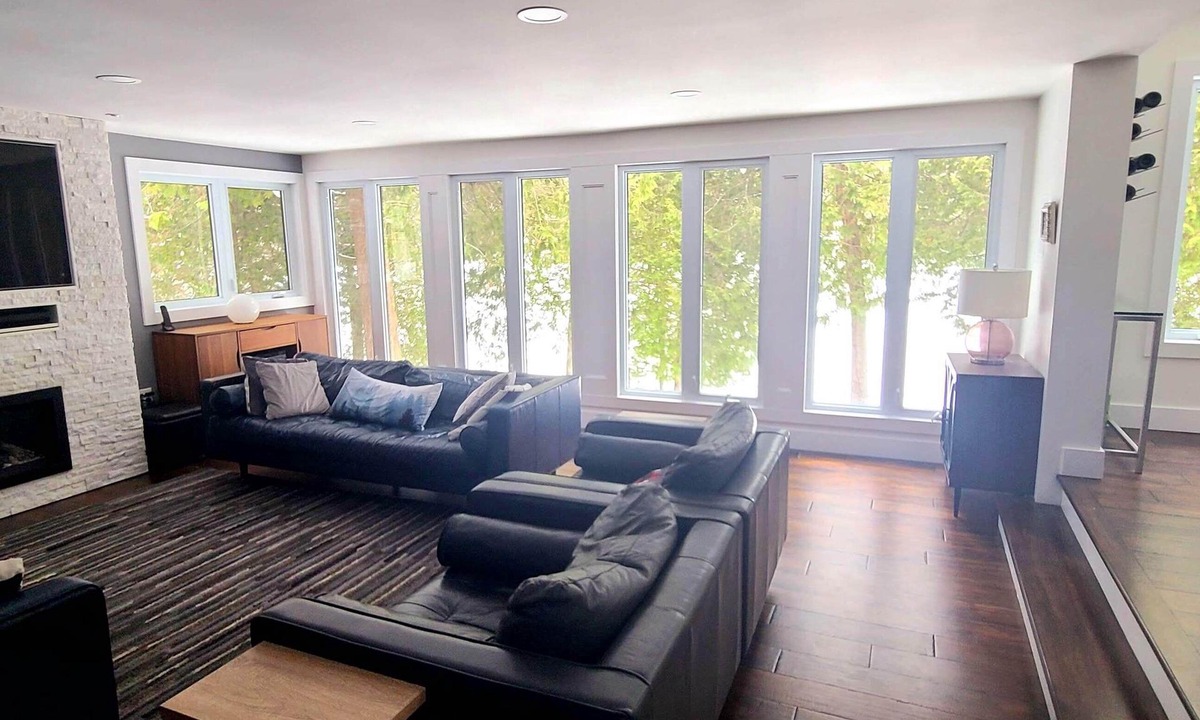 Feronia House | Beautiful lakefront home on Trout Lake! Hot tub and movie room included!