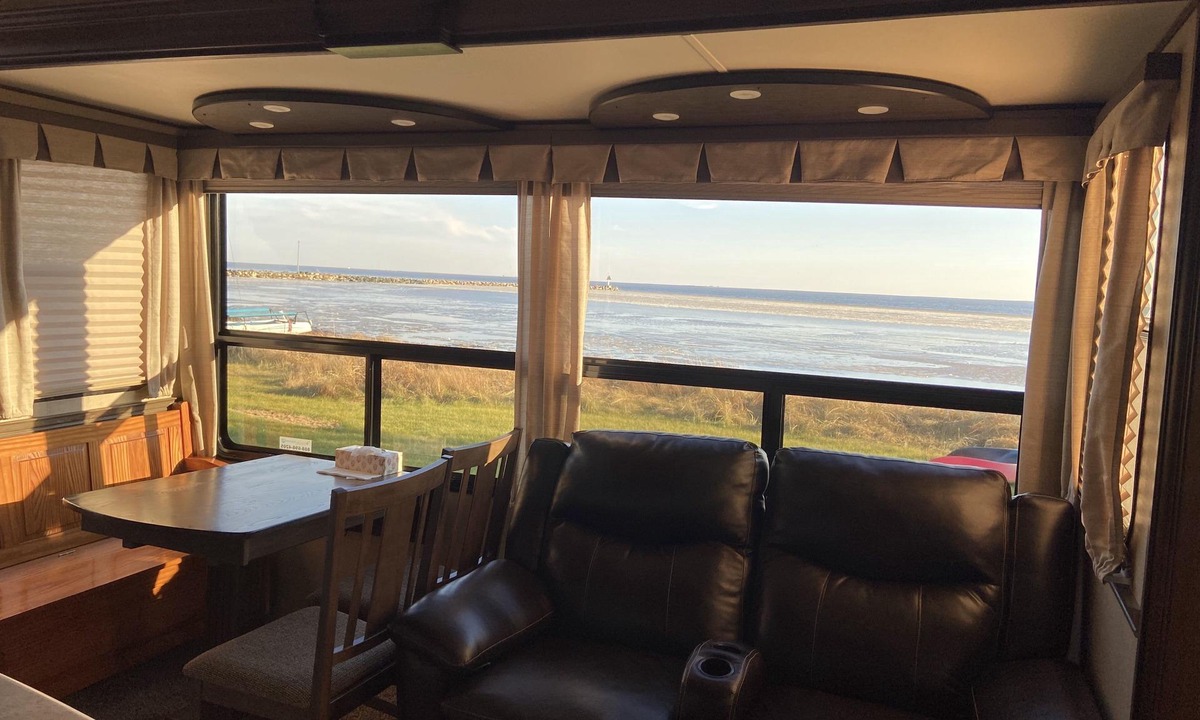 Neguac House | Camping in style with serene waterfront views!