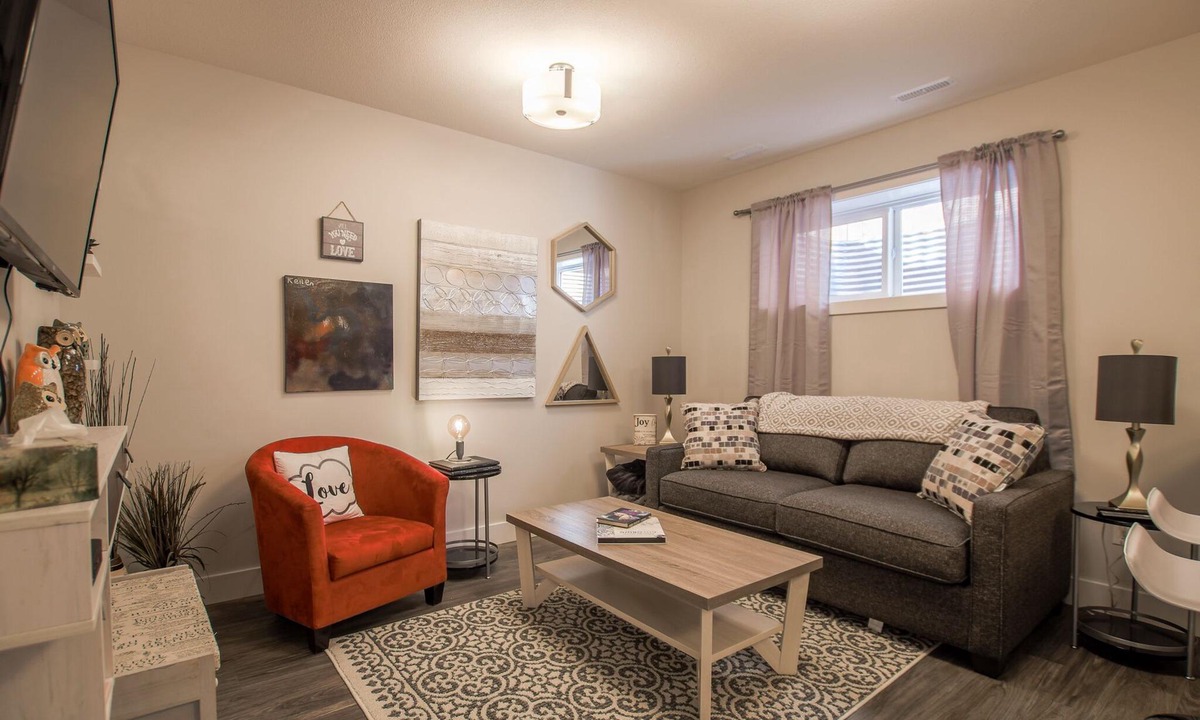 Lethbridge House | Cozy one bedroom suite with a pullout in the living room.