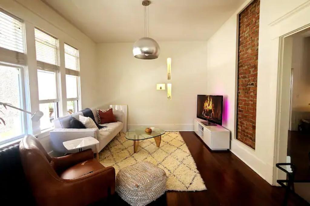 East Side House | Design Heritage Suite | Brick + Private Patio near Commercial Drive