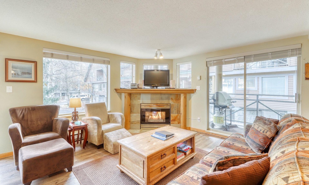 Village North House | Ideal first-floor getaway with hot tub, fireplace, & balcony - walk to lifts