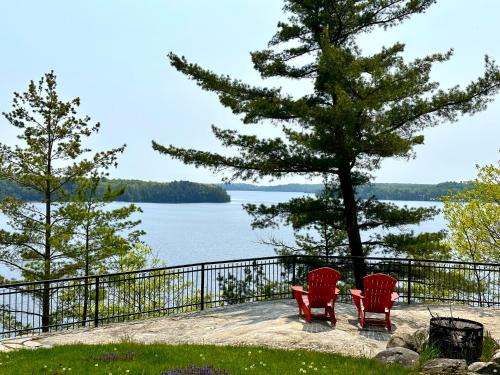 Seguin Villa | Lakefront Retreat Hot Tub Outdoor Sauna Dock Swim Stunning Views!