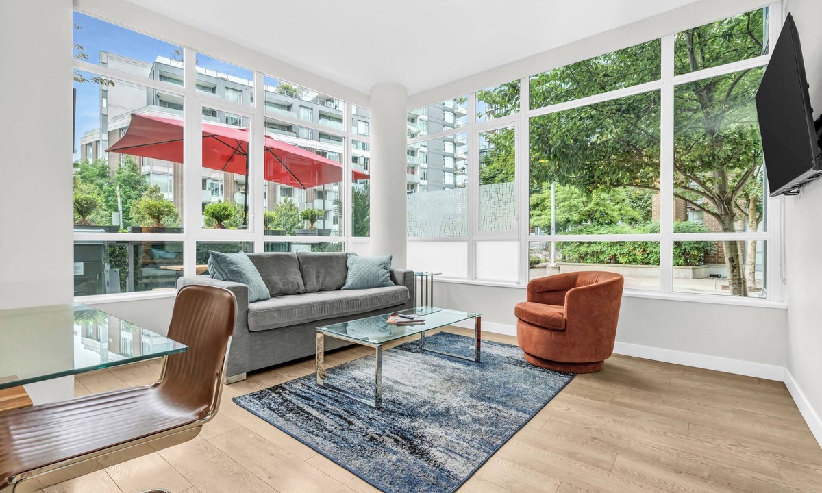 Southeast False Creek House | Location! Modern Urban Oasis with Premium King Size Beds and a Home Office