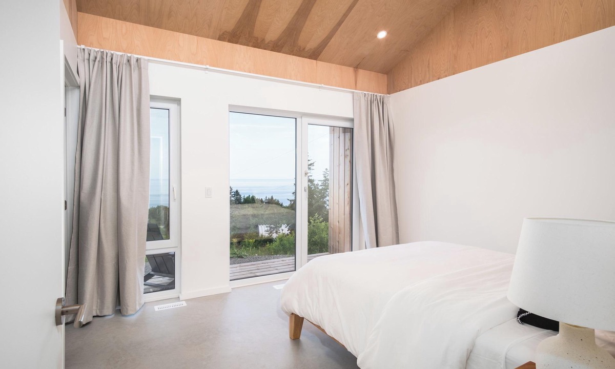 Inverness House | Modern 4 Bedroom, 4.5 bath home near Cabot Links with ocean views and sunsets.