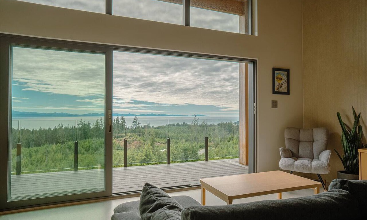 Juan de Fuca Electoral Area House | Panoramic ocean-view home tucked into the peaceful forest in beautiful Shirley.