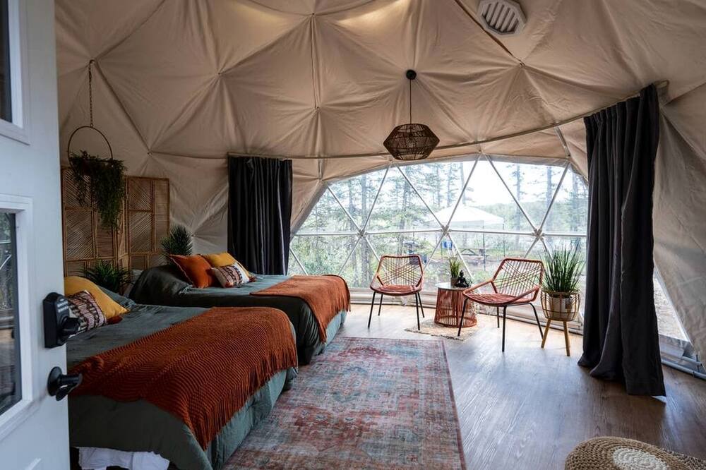Calgary RV Rental | Reconnect with Nature in Style: Riverside Dome Retreat in Alberta's Serene Setting