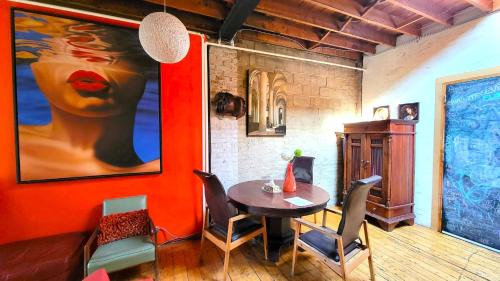 Little Portugal House | Unique Above Garage Loft