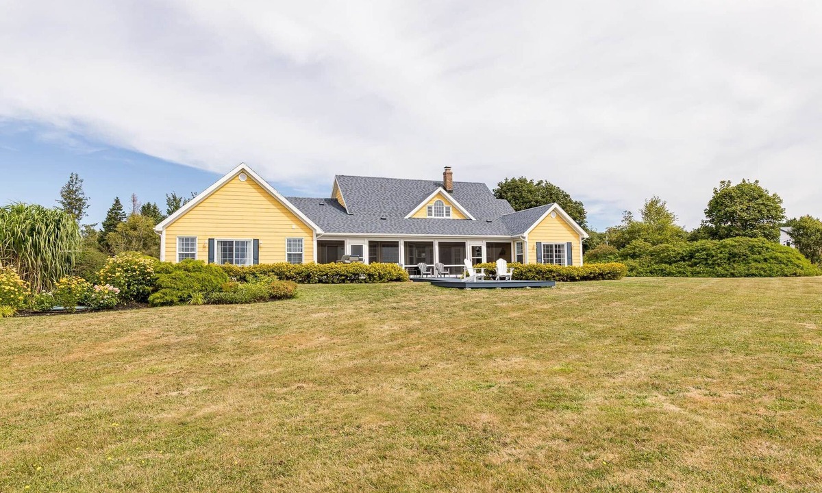 Stratford House | Yellow Beach House: Oceanfront PEI Retreat with Screened Porch & Beach Access