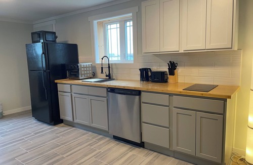 St. John's Apartment | 1 BRM suite w/kitchenette + hot tub + air conditioning- free off street parking