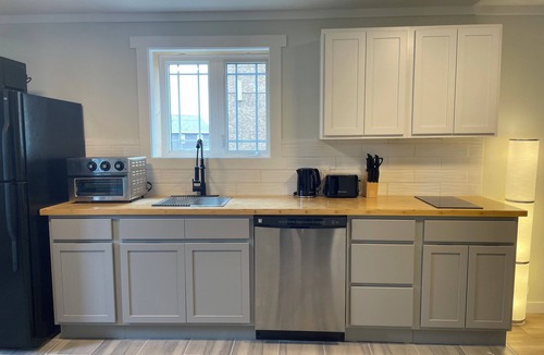 St. John's Apartment | 1 BRM suite w/kitchenette + hot tub + air conditioning- free off street parking