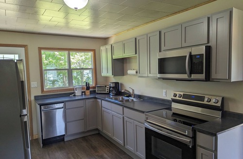 Inverness County Cottage | 2-Bedroom Cottage On Lake Ainlsie Private Beach, Enjoy Fishing & Swimming.