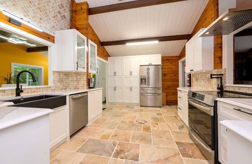 Terra Nova Ski Chalet | 4 Season Log Chalet Home with Hot Tub, Sleeps 17