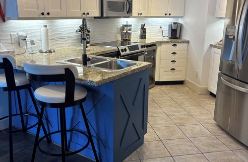Westbank Condo | Amazing professionally renovated and furnished on the water!