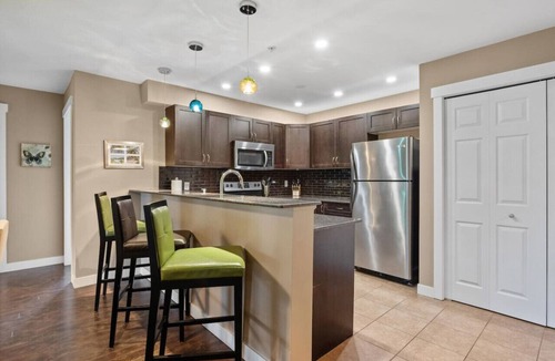 Invermere Apartment | Aqua Vista | Outside Pool/Hot Tub | Mountain Views
