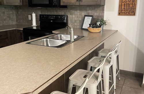 South Pandosy Condo | Beautiful 2nd Floor Condo on Quiet Creekside