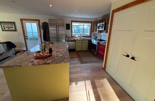 Cultus Lake House | Beautifully updated cottage steps from the lake.