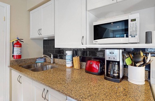 Craigleith Condo | Bright Creekside Condo - Pool, Hot Tub, Tennis!
