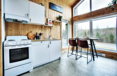 Sainte-Marguerite-du-Lac-Masson House | Lakeside Cabin Retreat with Beach, Kayaks, Fire Pit & Forest Trails