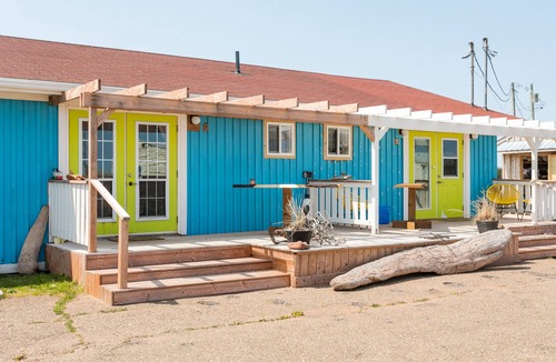 North Lake House | Captain’s Den is our executive blue toned all wooden room with a Captain’s flair