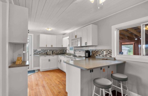Savage Harbour House | Charming 2-Bed Cottage in Savage Harbour with Beach & Enclosed Sunroom