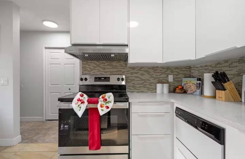 Montgomery House | Charming 4-bedroom house with AC in vibrant Calgary