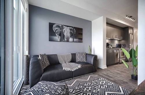 Bay Cloverhill Apartment | Chic 2BR Oasis with Skyline Views near Berczy Park