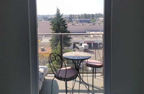 Sunset Condo | Contemporary & Pet-Friendly 1BR + Den Condo featuring a Charming Patio