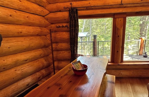 Crawford Bay Cabin | Creek side cabin in the woods with wood stove and deck - pet friendly!
