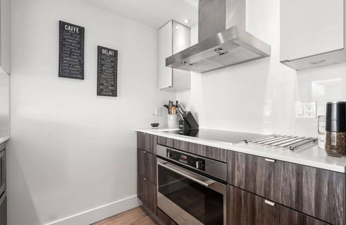 Southeast False Creek Apartment | Designer 2BR w/City Views| Prime Olympic Village