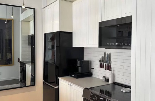 King West Village Condo | Downtown heritage brick loft with 16' ceilings