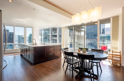 Coal Harbour Apartment | Elevated Coal Harbour living with panoramic harbour & mountain views, steps to Vancouver's iconic waterfront, dining and shopping.