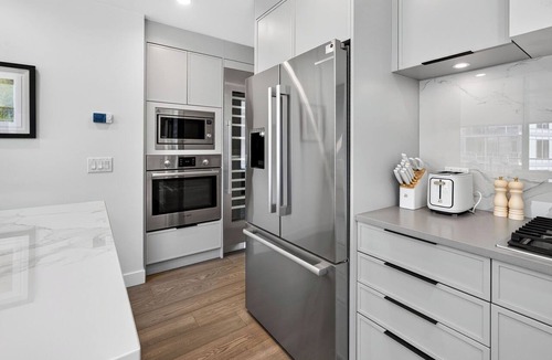 South Pandosy Condo | Enjoy a luxurious 2-bedroom retreat featuring two comfortable queen beds and a prime location just steps from Okanagan Lake. Perfect for a relaxing getaway with modern comforts and easy access to the beauty of the lake.
