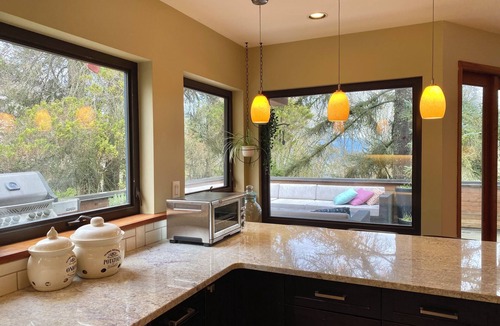 Burnaby House | Executive home on Capitol Hill at forest edge with hot tub, fire pit, backyard