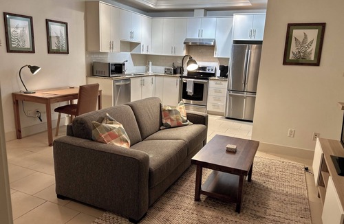 Canyon Heights Apartment | Fern Hollow - unwind in this nature inspired suite in Edgemont Village.