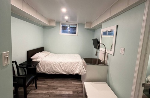 Brantford House | Full basement with one Queen and one single Bed