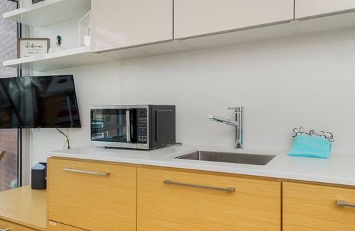Downtown Victoria Condo | Gallery - Light and photo art filled modern studio in Victoria's Chinatown by Victoria Prime!