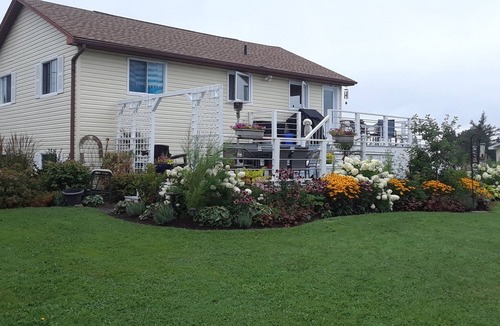 Saint-Joseph-de-Kent House | House with multi-level deck and water views in Bouctouche