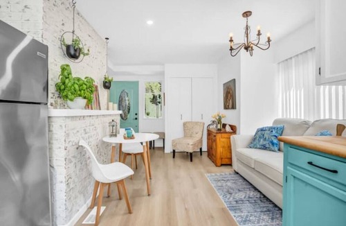Lynn Valley House | King Bed with front door parking and private courtyard. Designed for living.