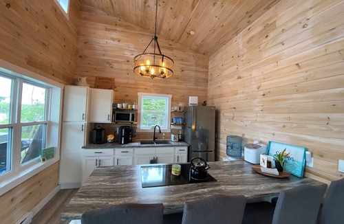 Boylston Cottage | Lake side cottage with hottub, indoor and outdoor fireplace. Cozy quiet space.