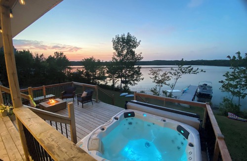 Boylston Cottage | Lake side cottage with hottub, indoor and outdoor fireplace. Cozy quiet space.