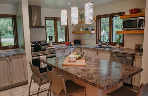 St-Adolphe-d'Howard Cottage | Lakefront Chalet w/Hot Tub & Mountain Views