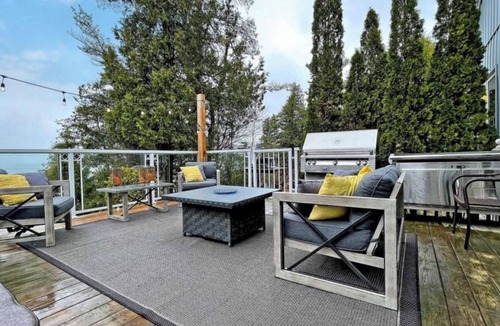 Brock House | Lakefront Cottage w/Hot Tub, BBQ Grill, Patio, Fire Pit, Dock, Sauna, Fire Place