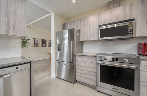 Central Lonsdale Apartment | Live the North Shore dream in this mountain-view penthouse!