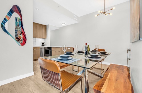 Southeast False Creek House | Location! Modern Urban Oasis with Premium King Size Beds and a Home Office