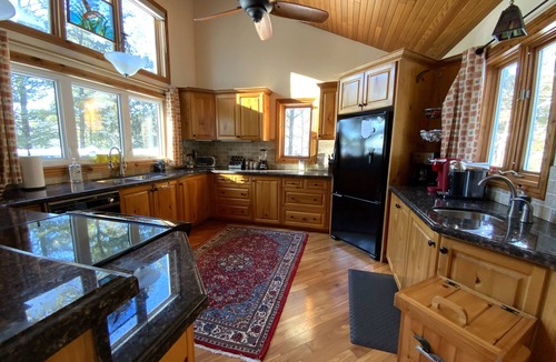 Windermere Cottage | Log home & guest cottage in old forest, Waterfall, Sunsets, Sauna, Fishing Boat