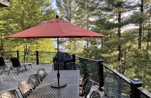 Windermere Cottage | Log home & guest cottage in old forest, Waterfall, Sunsets, Sauna, Fishing Boat