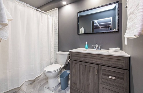 Prince George House | Luxurious new home with games room near the hospital for 10 guests