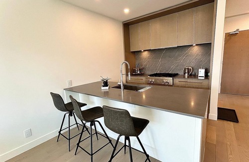 South Pandosy Condo | Luxury Lakeside Getaway. CABAN condo at Gyro Beach Park. 2 Bed (King Bed)/2 Bath