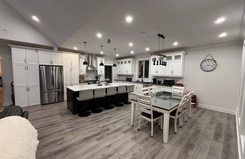 Woody Point Ski Chalet | Main Chalet#1 Waterfront Sleeps 16 open concept Kitchen-Living area, 2.5 baths
