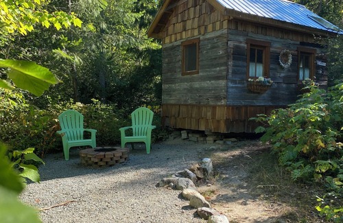 Mara Cabin | Mini solar cabin in the woods off grid glamping at its finest near Mara lake bc